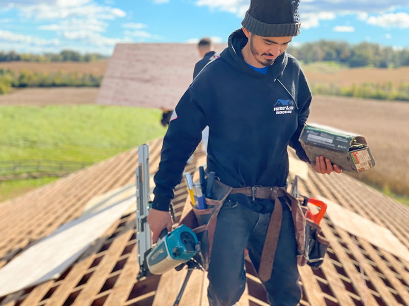 Freddy and Son Worker on Roof